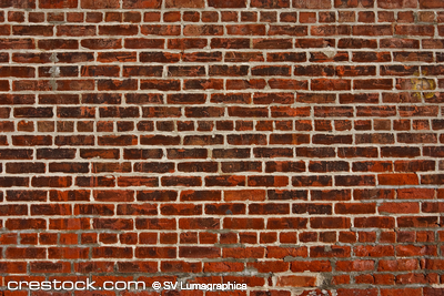 old weathered stained red brick wall background